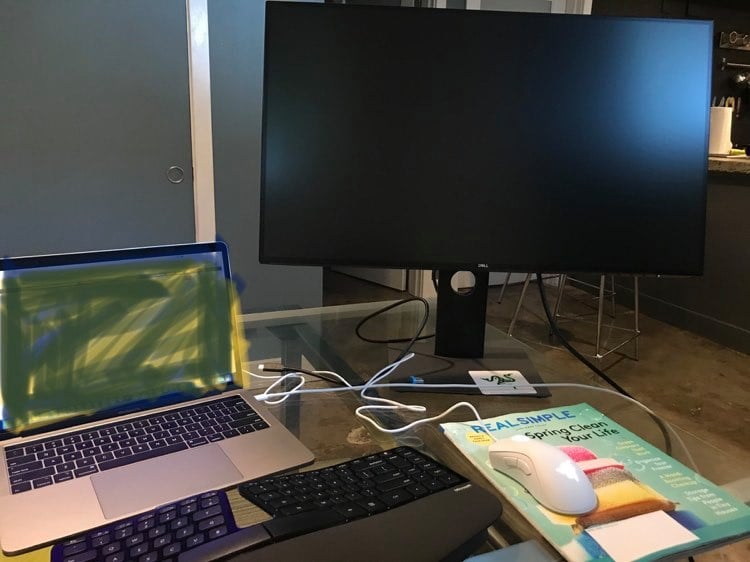 nisha\'s work laptop and monitor setup