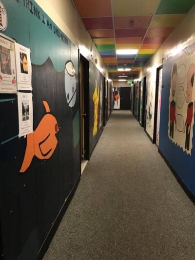 the hallway outside nisha's room