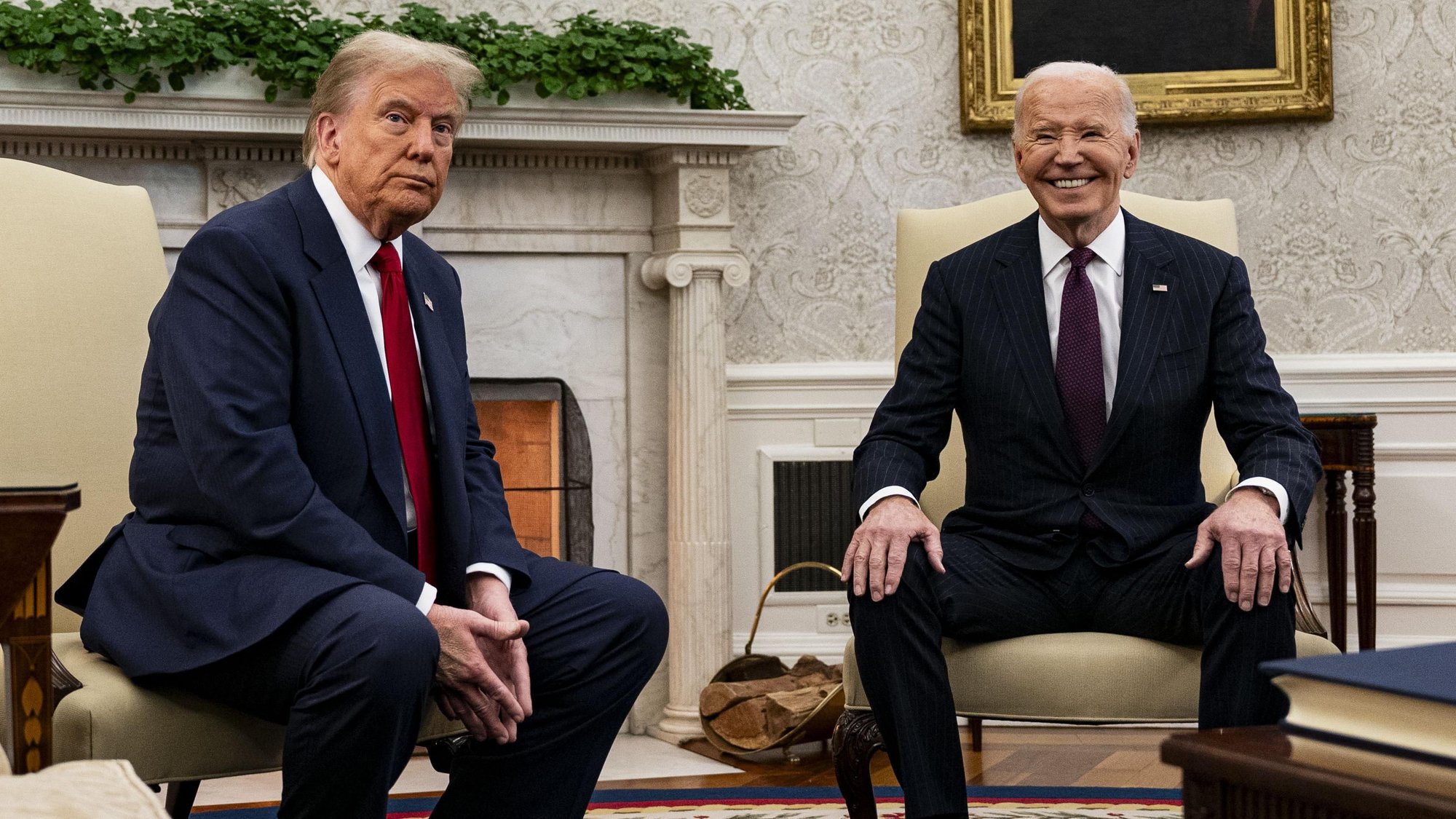 Donald Trump being welcomed back to the White House by Joe Biden