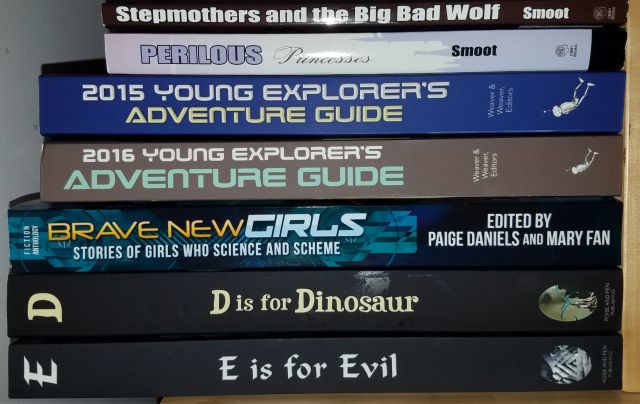 Image of book spines of anthologies including Jeanne's stories