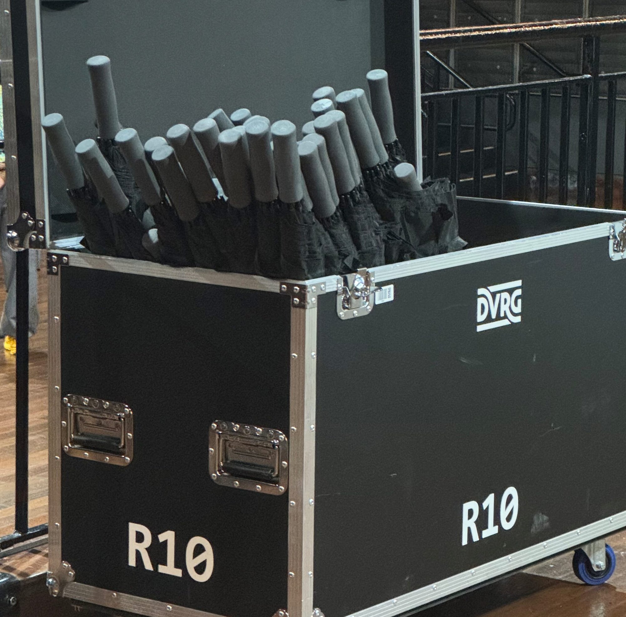 umbrellas sticking out of a flight case