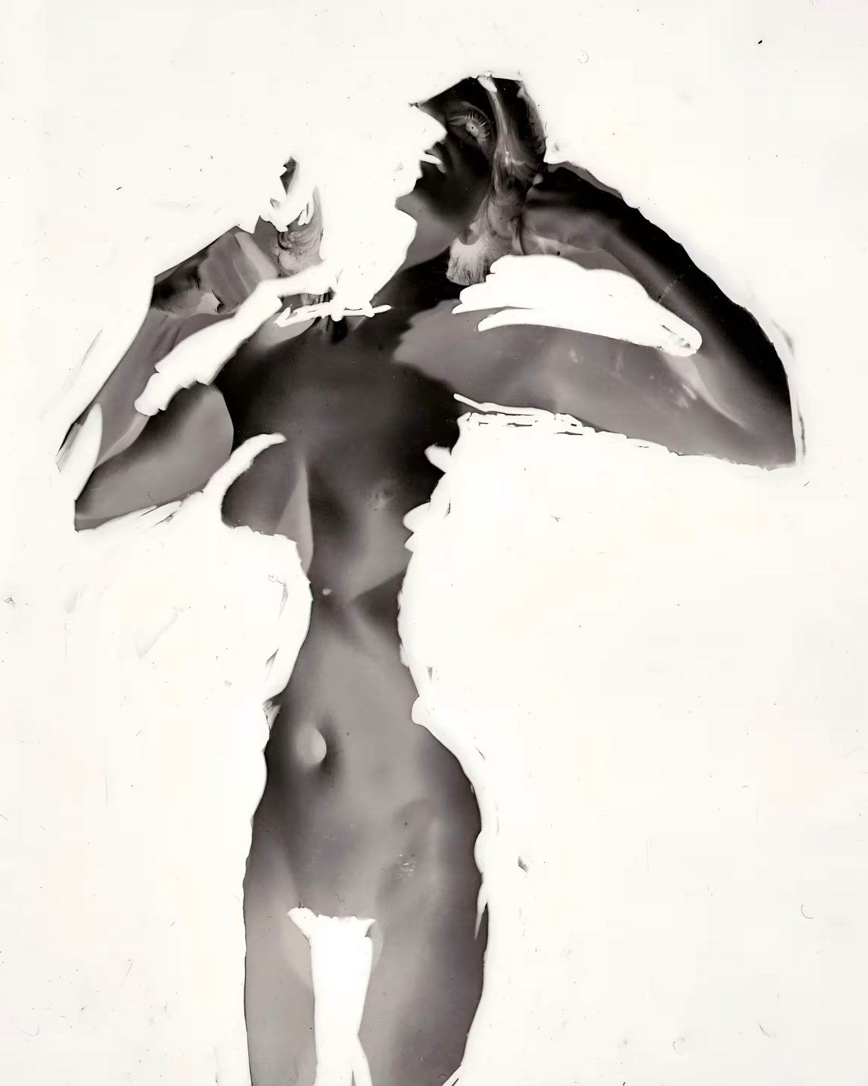 Woman with hands in hair