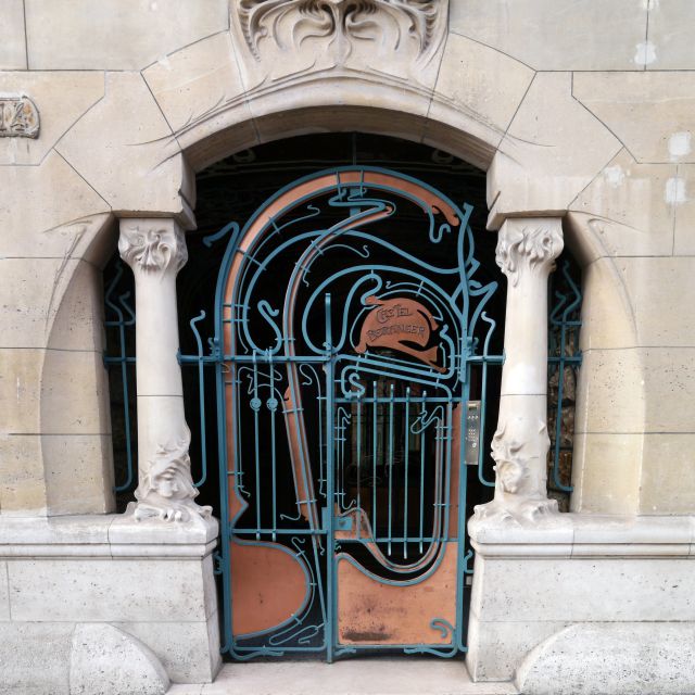 Fanciful gate with copper and blue accents