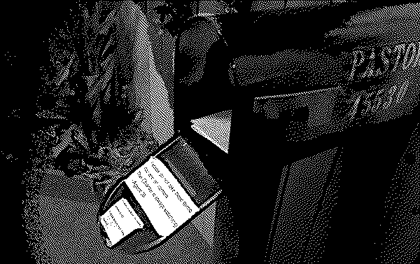 Mailbox, open, with a warning: Please do not take these items. You are on camera. The Charter is always watching. —Agent 39