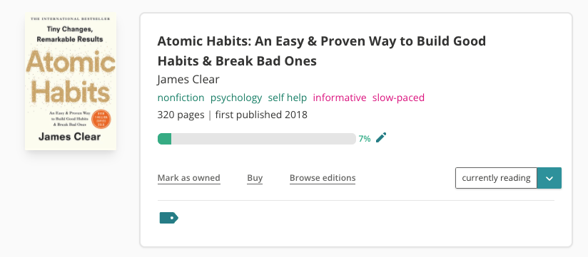 StoryGraph book pane for Atomic Habits by James Clear. The cover is to the left and features a cream background with gold large text reading "Atomic Habits". On the right is the book information. It's tagged with 'nonfiction, psychology, self help, informative, slow-paced'. There is a progress bar filled up with green by 7% and the book is marked at 'currently reading'.