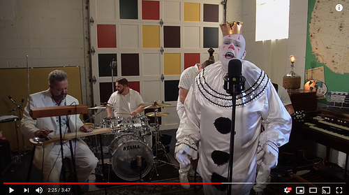 still from "The Sound Of Silence - Un-DISTURBED version" with Puddles [click to view video]
