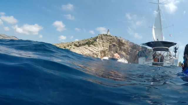 image of an interface between dinghy and lighthouse