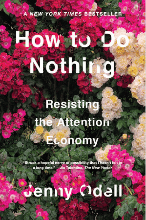 book cover of How to do Nothing: Resisting the Attention Economy in white lettering atop a photograph of flower bushes