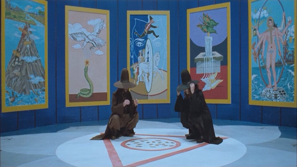 Alejandro Jodorowsky's The Holy Mountain (1973), where surreal symbolism and mystic rituals converge in a quest for spiritual enlightenment