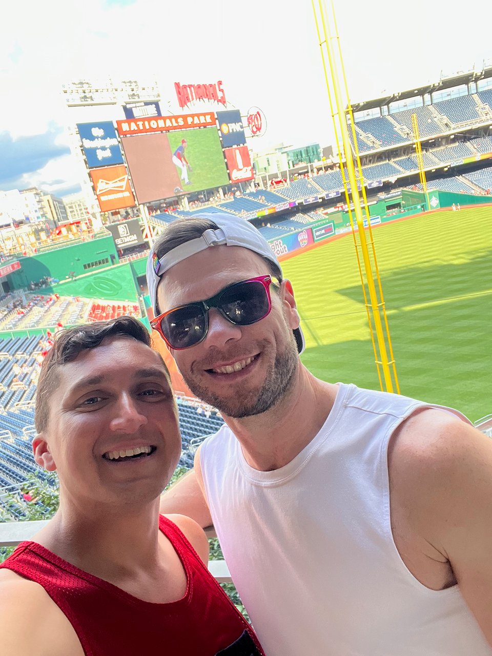 two men at a baseball stadium