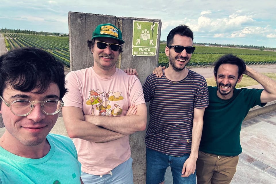 David, Nick, Nico, and Tomás posing and laughing together at a vineyard in Argentina