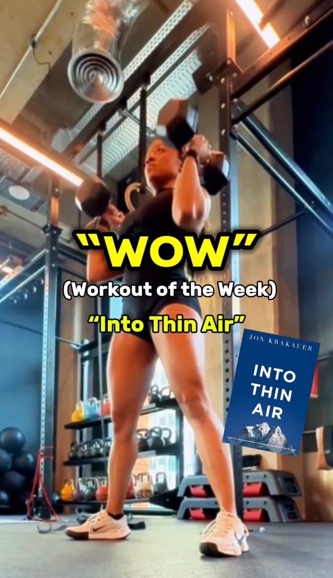 A "WOW" (Workout of the Week) social media graphic titled "Into Thin Air," showing me performing a dumbbell overhead press in a gym, with the cover of Jon Krakauer's "Into Thin Air" overlaid in the bottom right corner — combining a book-themed workout concept with fitness content.