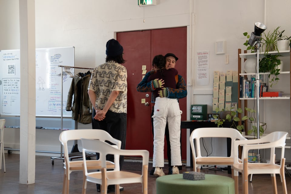 People hugging.