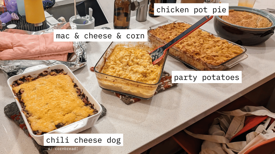 a kitchen with a variety of casseroles on the counter
