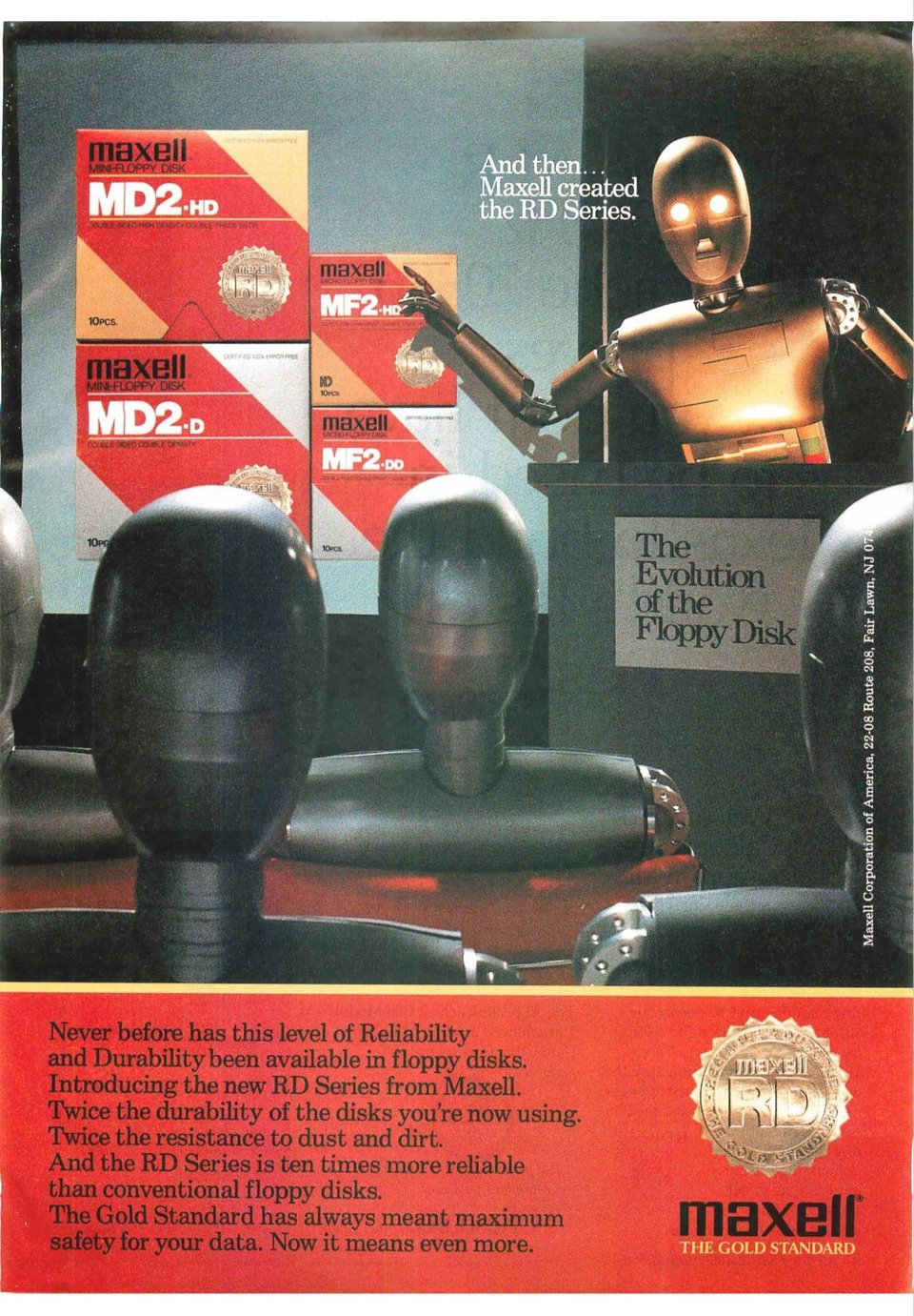 A gold robot is standing in front of a projector screen and a lecture stand. The screen shows a variety of Maxell floppy disks and the lecturn has a sign that reads "The Evolution of the Floppy Disk". There are several silver robots sitting in the audience, watching the gold robot's lecture.
