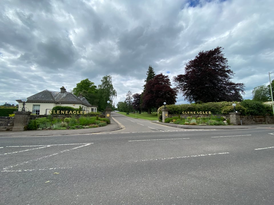 Entrance to Gleneagles hotel, complete with gold letters spelling out Gleneagles.