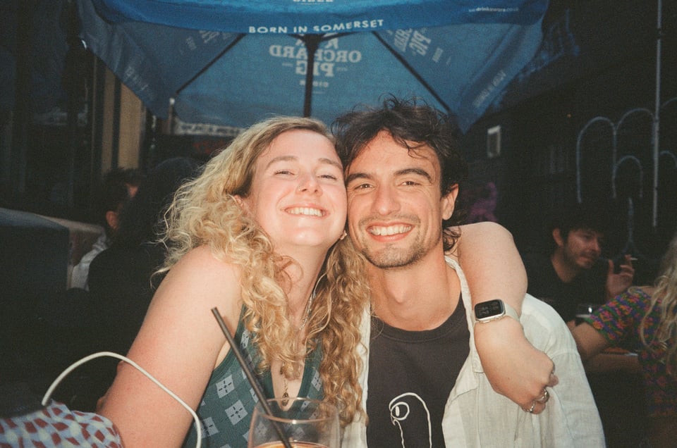 a man and woman posing for a picture
