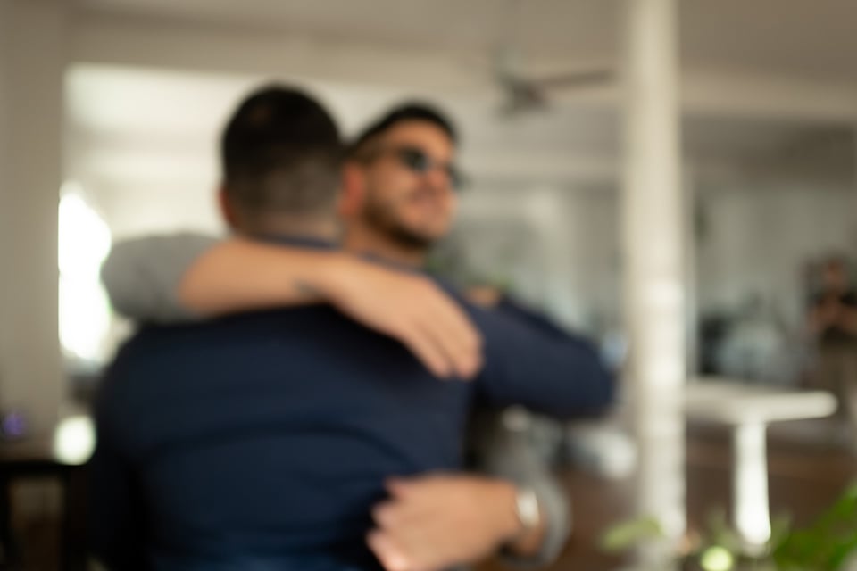 A blurry photo of a hug.