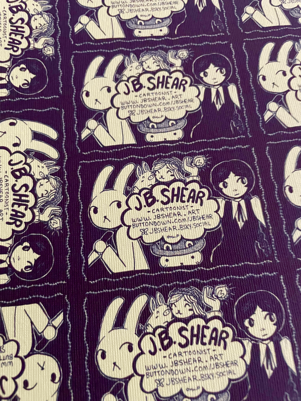 photo of a sheet of printed business cards