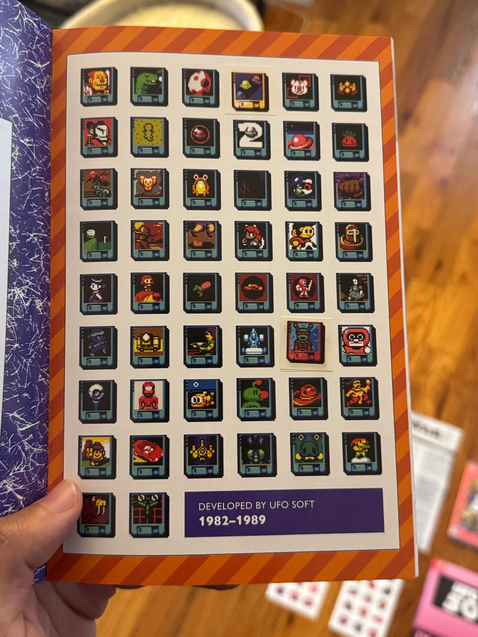 all 50 UFO 50 Cartridges in alphabetical order. The Big Bell Race is gold stickered and Party House is cherry stickered.