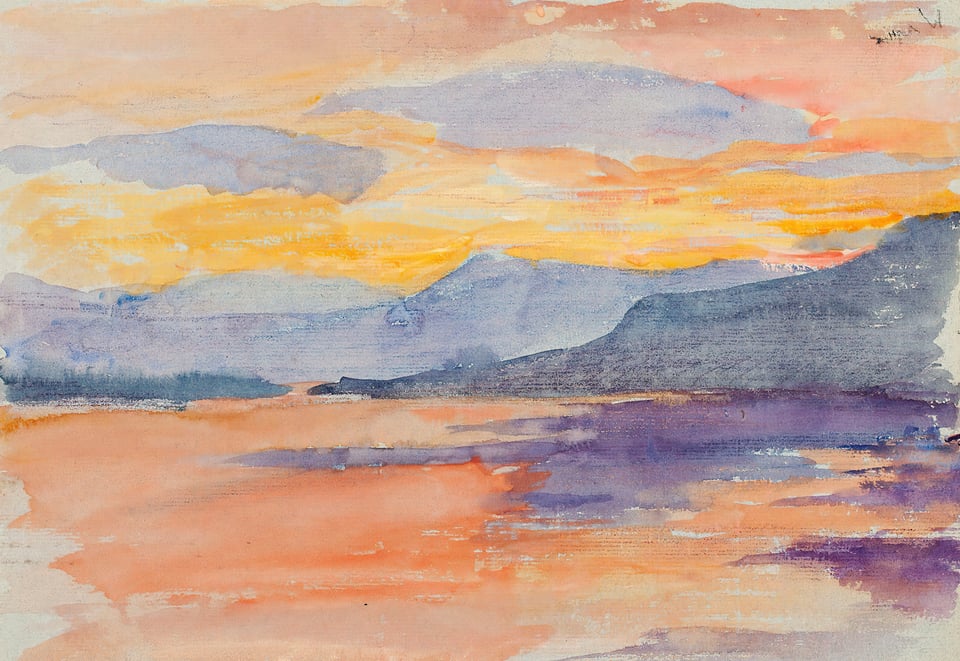 Mountain landscape in the orange evening sky