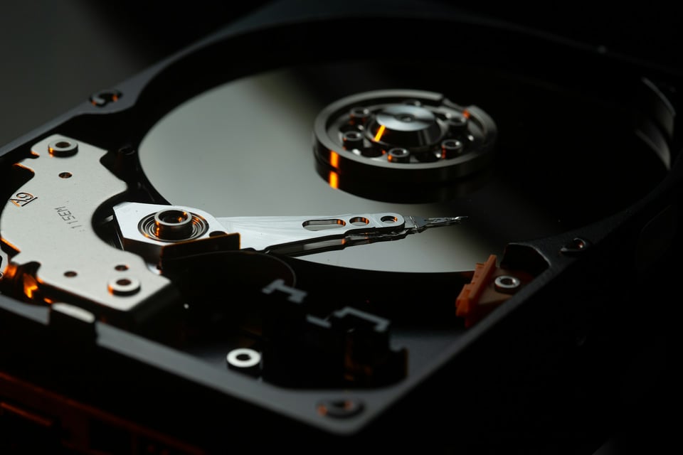 Close-up shot of an internal hard drive. Photo by benjamin lehman on Unsplash.