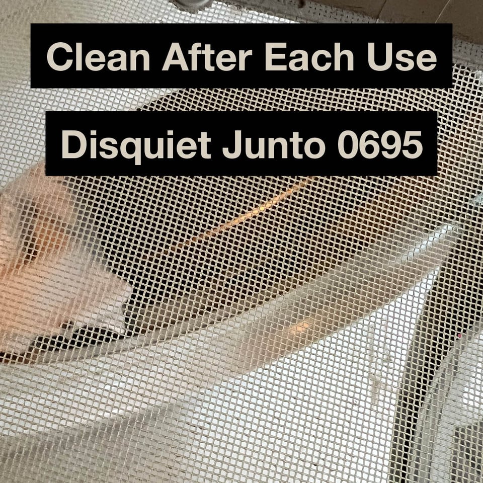 This image shows a clothes dryer as seen through the mesh of the lint trap, plus the name and number of the project