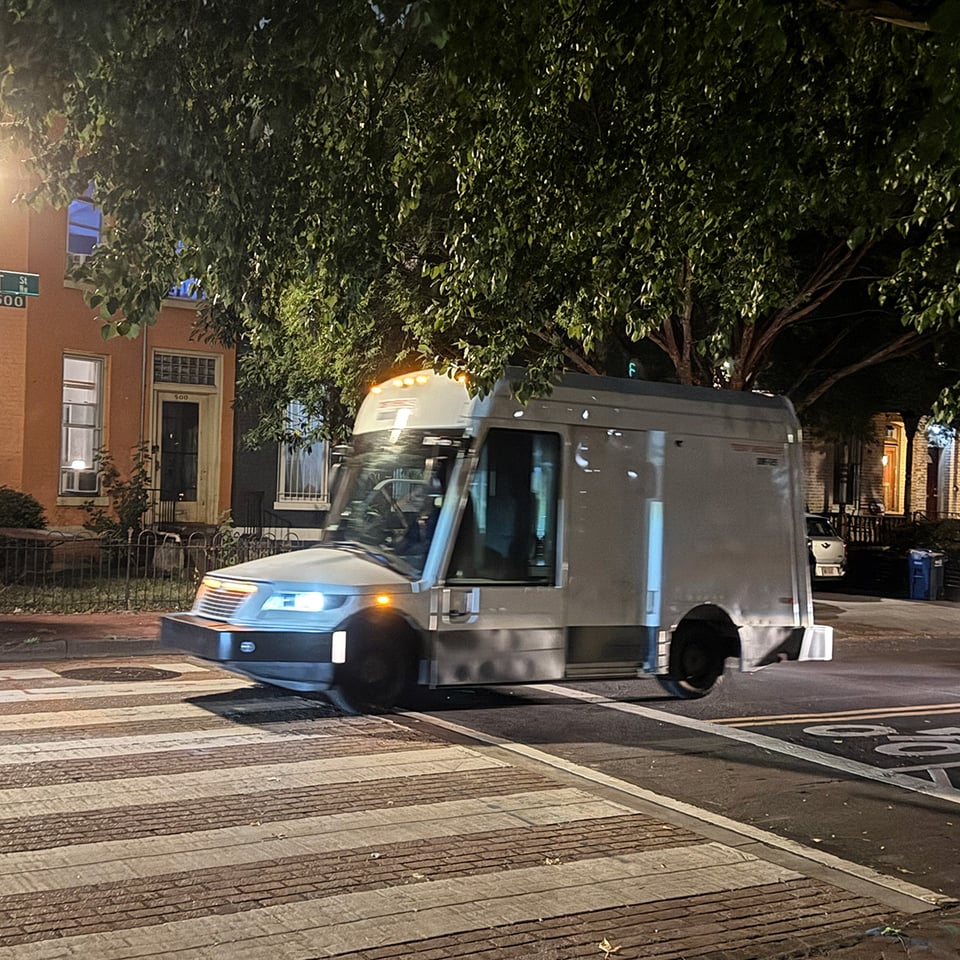 Image of a new postal delivery van.