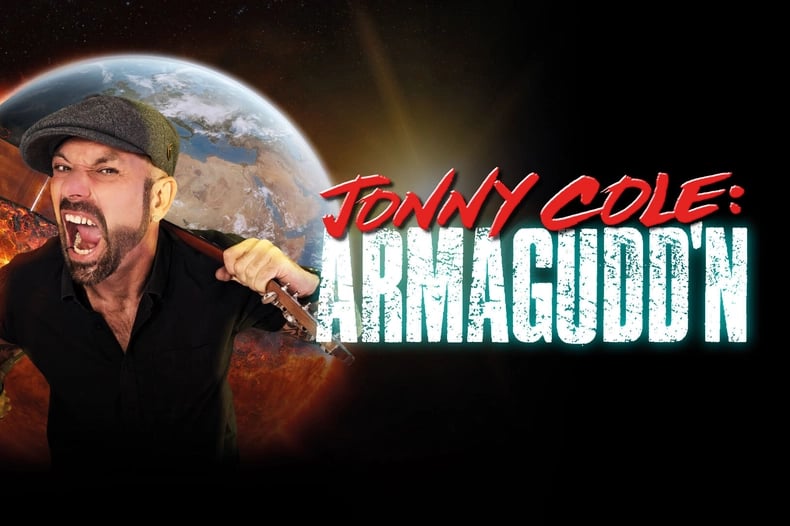 Promotional image showing a bearded man in a black flat cap and black shirt, mouth open mid-shout whilst gripping a knife, against a background of Earth engulfed in flames. Text reads "Jonny Cole: Armaguddn" in red and white distressed lettering. The apocalyptic theme suggests this is comedy show artwork playing on end-of-the-world imagery.