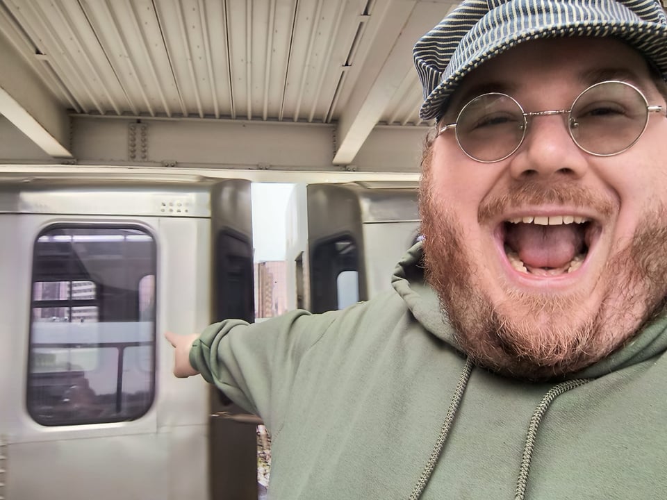Me pointing at the L train