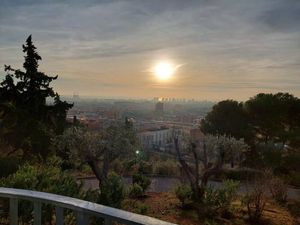 Barcelona looking lovely, as seen from up a hill in Horta, one January morning.