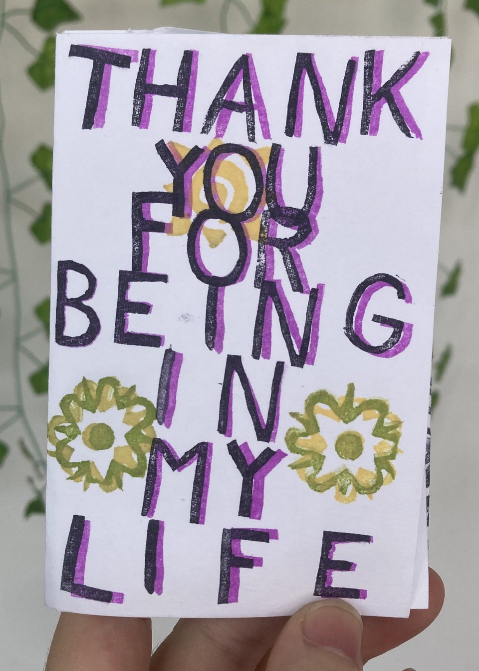 Small, handmade zine that says, with stamped letters, "THANK YOU FOR BEING IN MY LIFE"