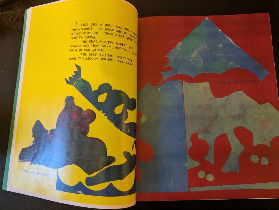 A child's rendition of a bear and rabbit.