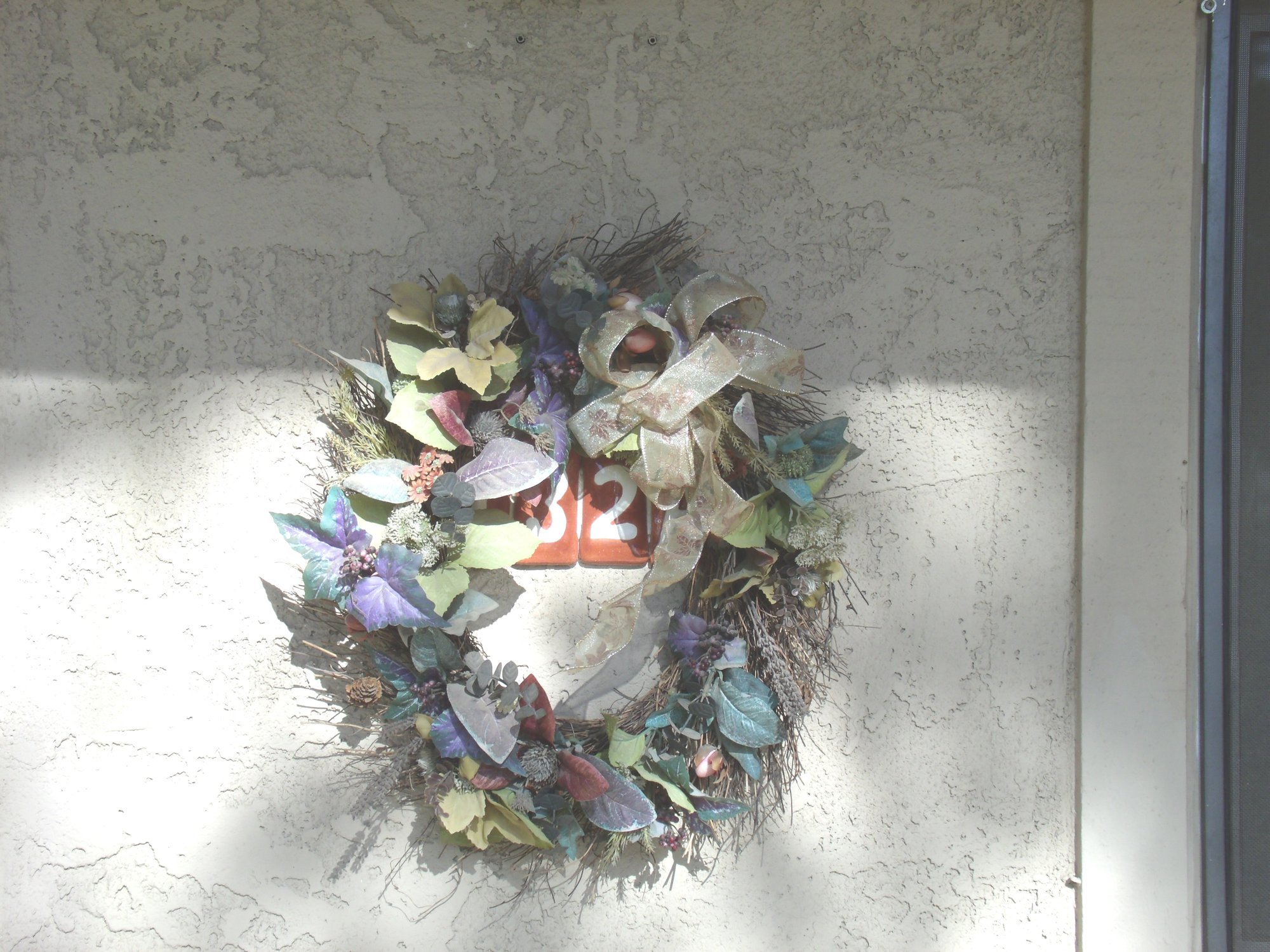 A funeral wreath on 132A, the apartment of the Winfield Apartment building where actor Bob Crane of Hogan's Heroes fame was murdered on June 29, 1978. The Condo is located at 7430 E. Chaparral Road in