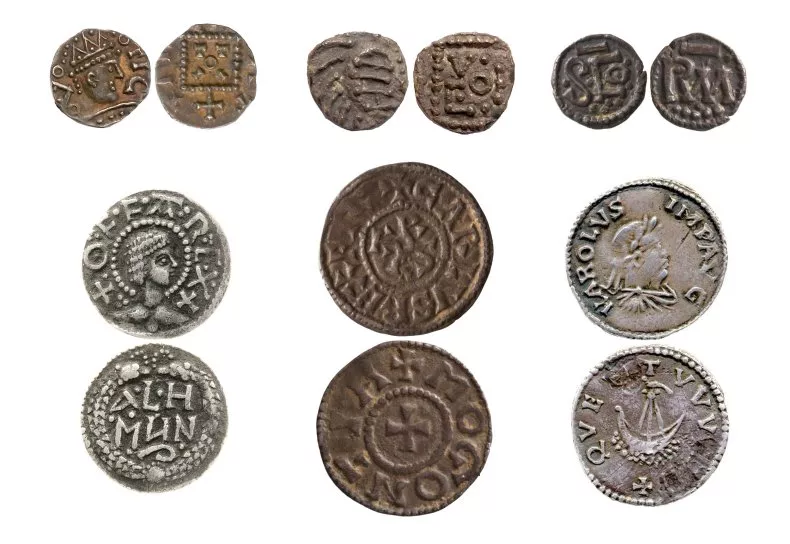 A collection of 6 coins, shown front and back (so 12 images), with a variety of words, symbols, and images - a head, a ship, a cross, etc.