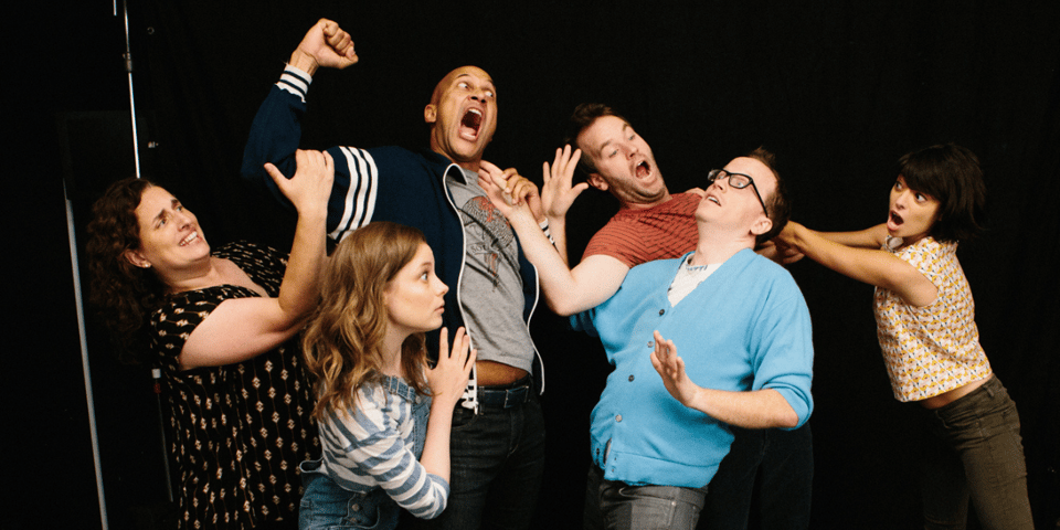 The cast of Don't Think Twice having a play fight.