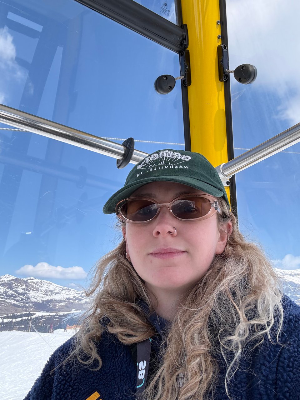 a woman on a ski lift
