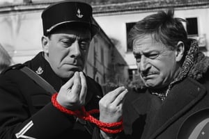 italian actor toto and french actor fernandel with hands tied
