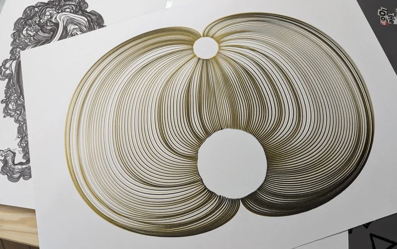 A pen plotted design with numerous lines connecting two circles via curves. The even lines are black and the odd ones golden.