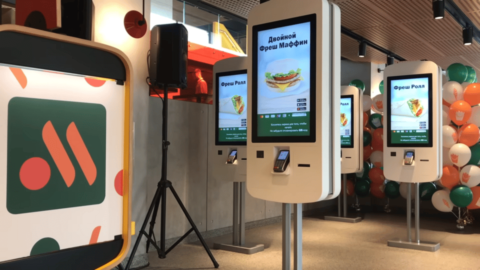 Touchscreen ordering kiosks from Russian fast-food chain Вкусно — и точка. Photo credit: Wikimedia Commons.