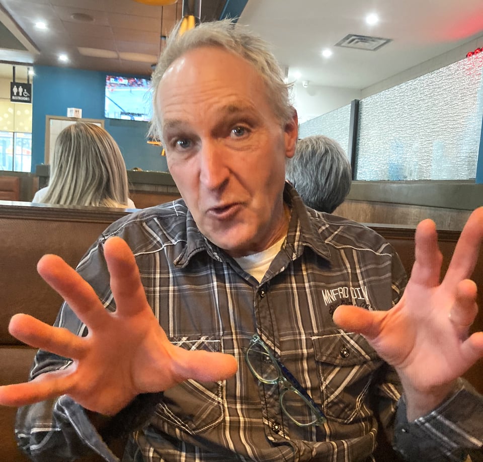 HANDS ON Insightful reader Jeff Beardsworth of St. Albert, Alberta, is accustomed to using his hands to bring home a point. We grabbed this shot at a breakfast meeting before Christmas. I love it so.