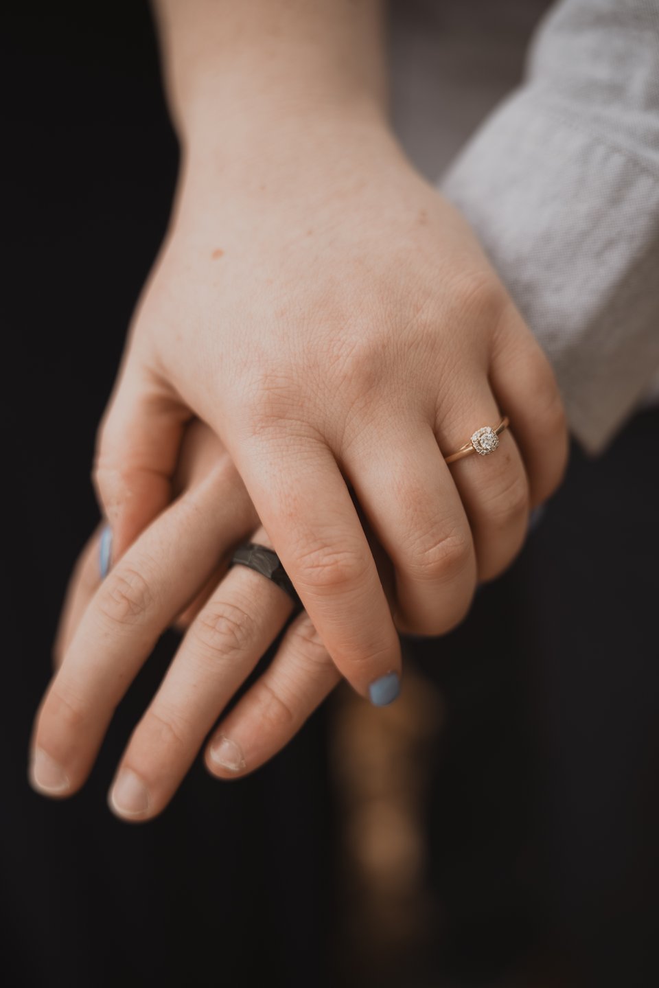 a couple holding each other's hands