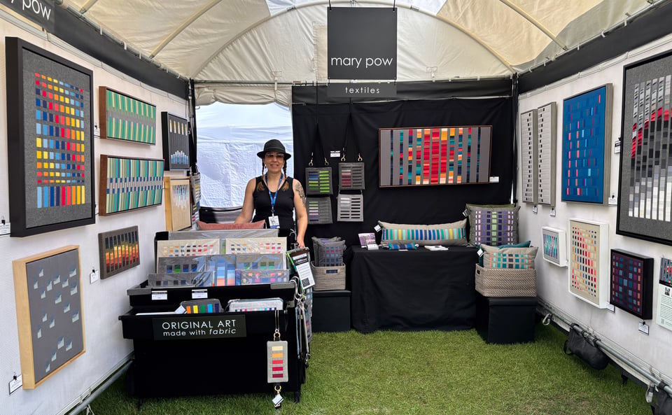 art fair booth of mary pow and her textile art