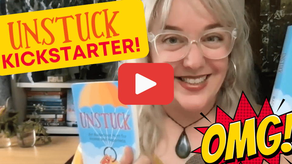 An image of Rachael holding her new book with a video button