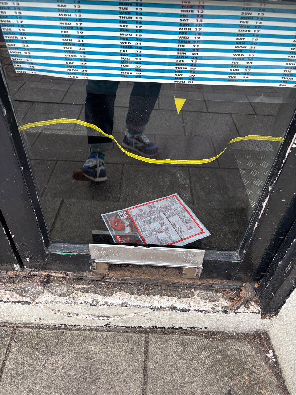 The listings, in a doorway