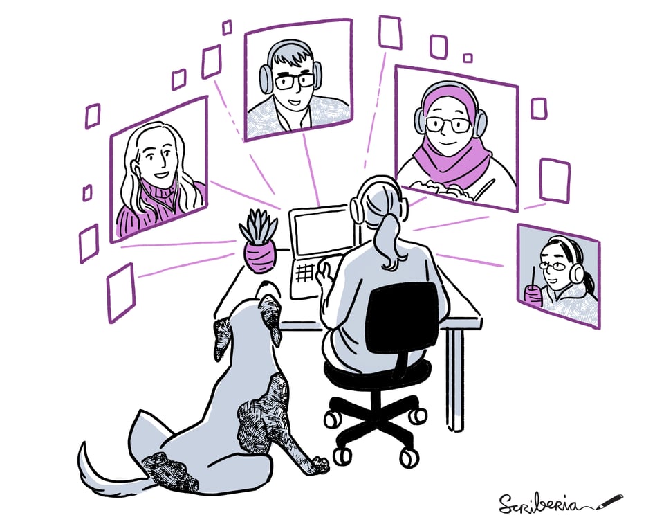 A women sitting in her home office in a remote meeting looking at a screen with peoples faces coming out.
