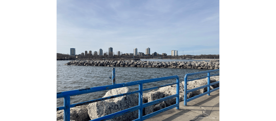 view of Milwaukee skyline from a Lake Michigan beach