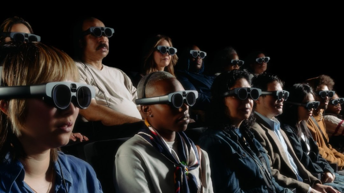 Two lines of people from various backgrounds, all wearing the Magic Leap Two glasses - thick plastic frames with big bug-like circles for the lenses.