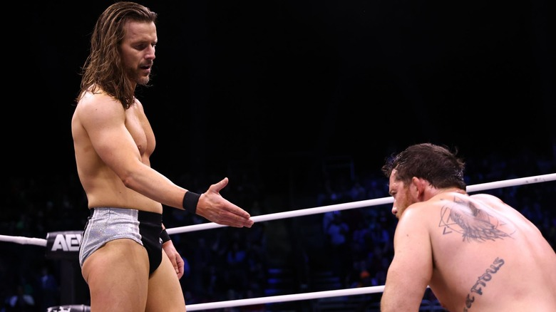 Adam Cole extends his hand to Kyle O'Reilly after defeating him for a chance to face MJF at the World's End PPV.