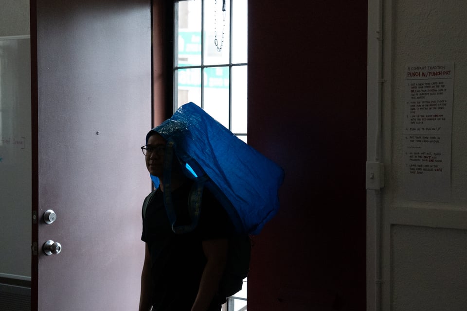 Norton wearing a bag on his head.